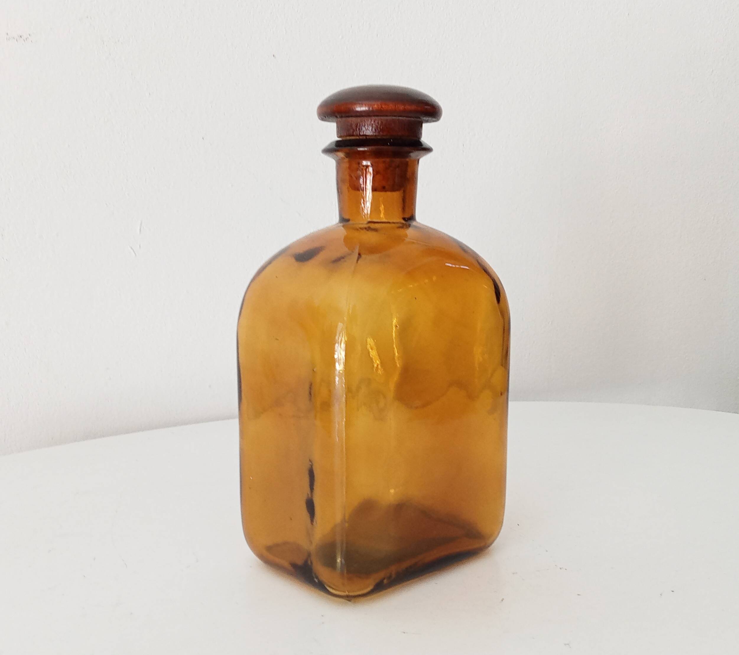 Vintage amber glass apothecary bottle