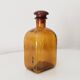 Vintage amber glass apothecary bottle