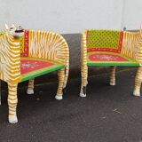 Paire de fauteuils en bois apparence "tigre"