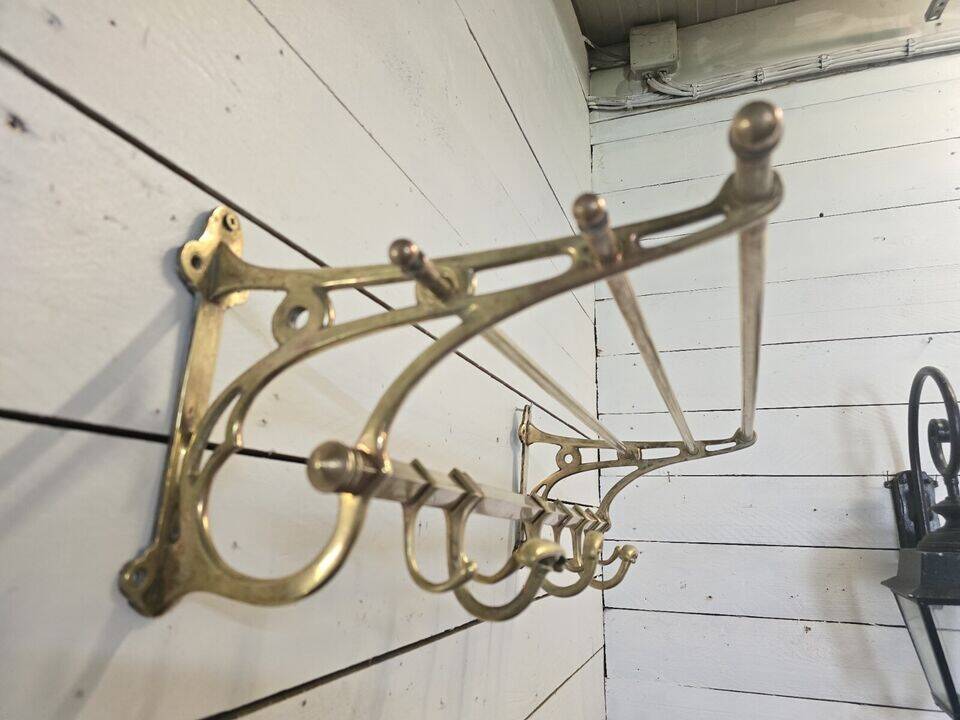 Wall-mounted coat rack with brass hat rack