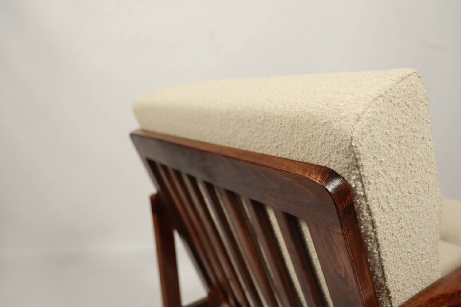 Vintage dark wood beige bouclé armchair by Z.Baczyk 1965