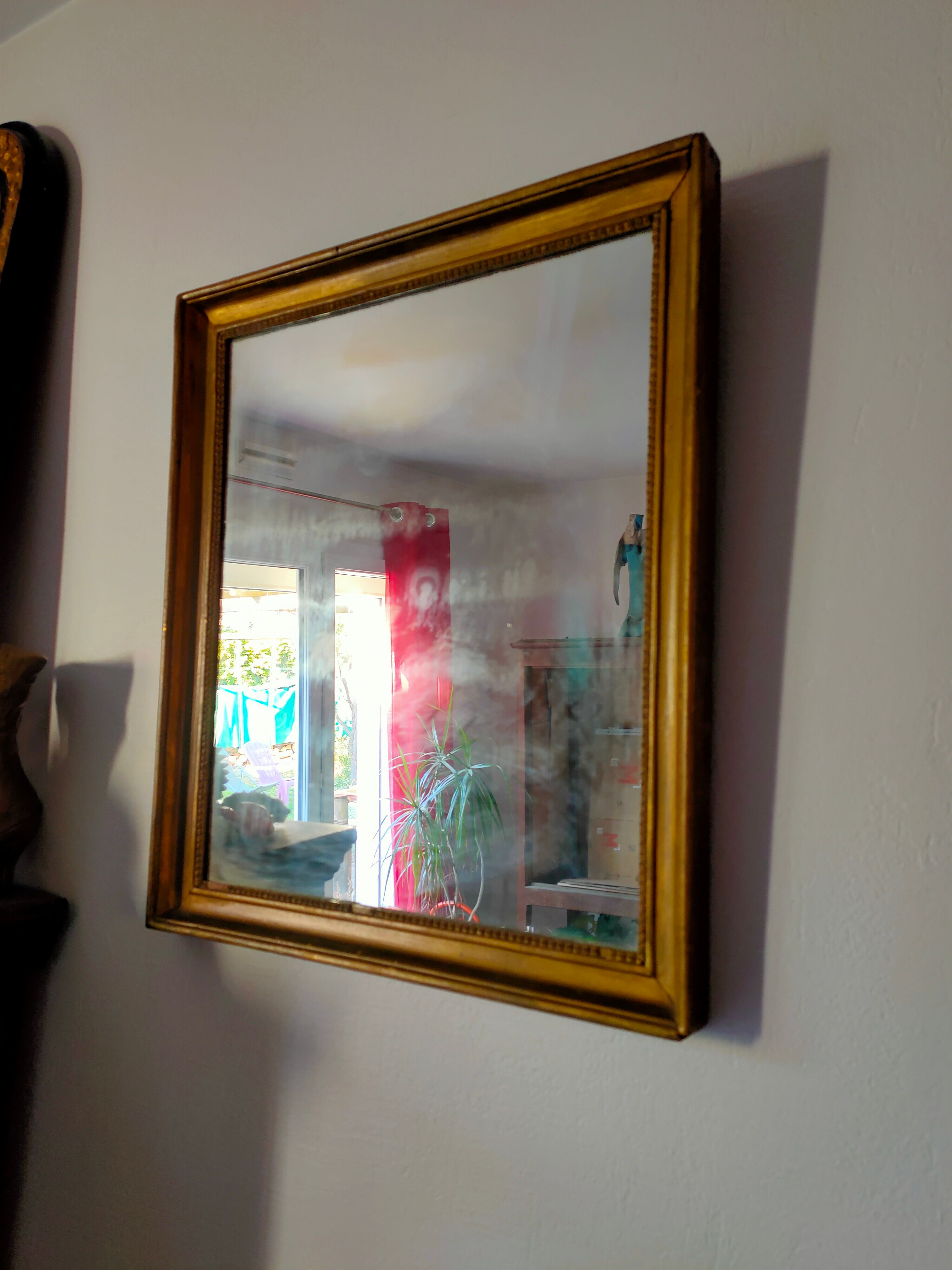 Rustic golden mirror