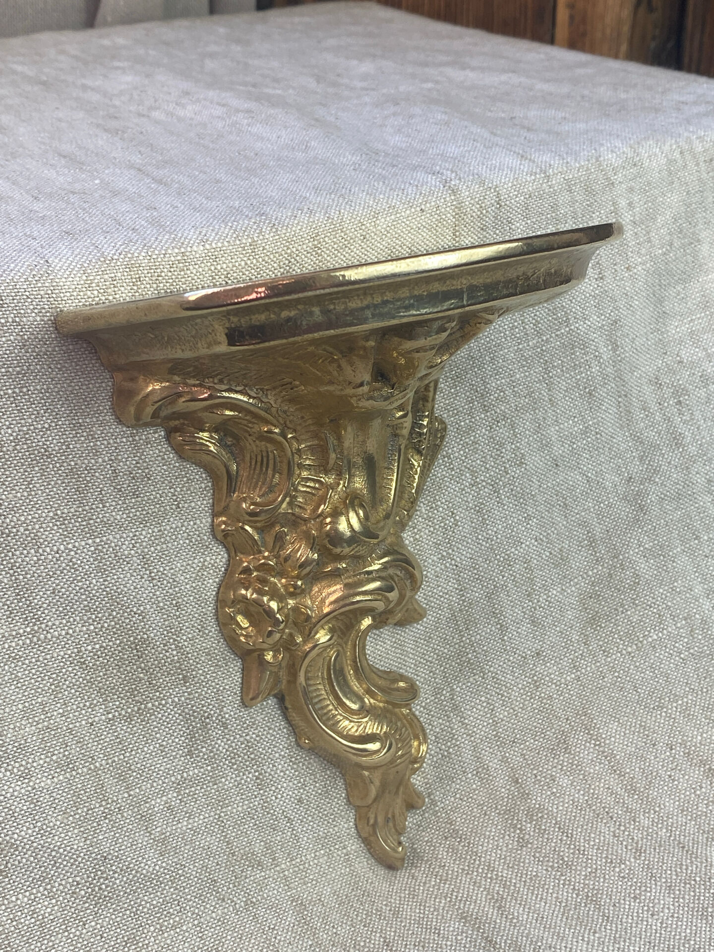 Small wall console in Rococo style in bronze