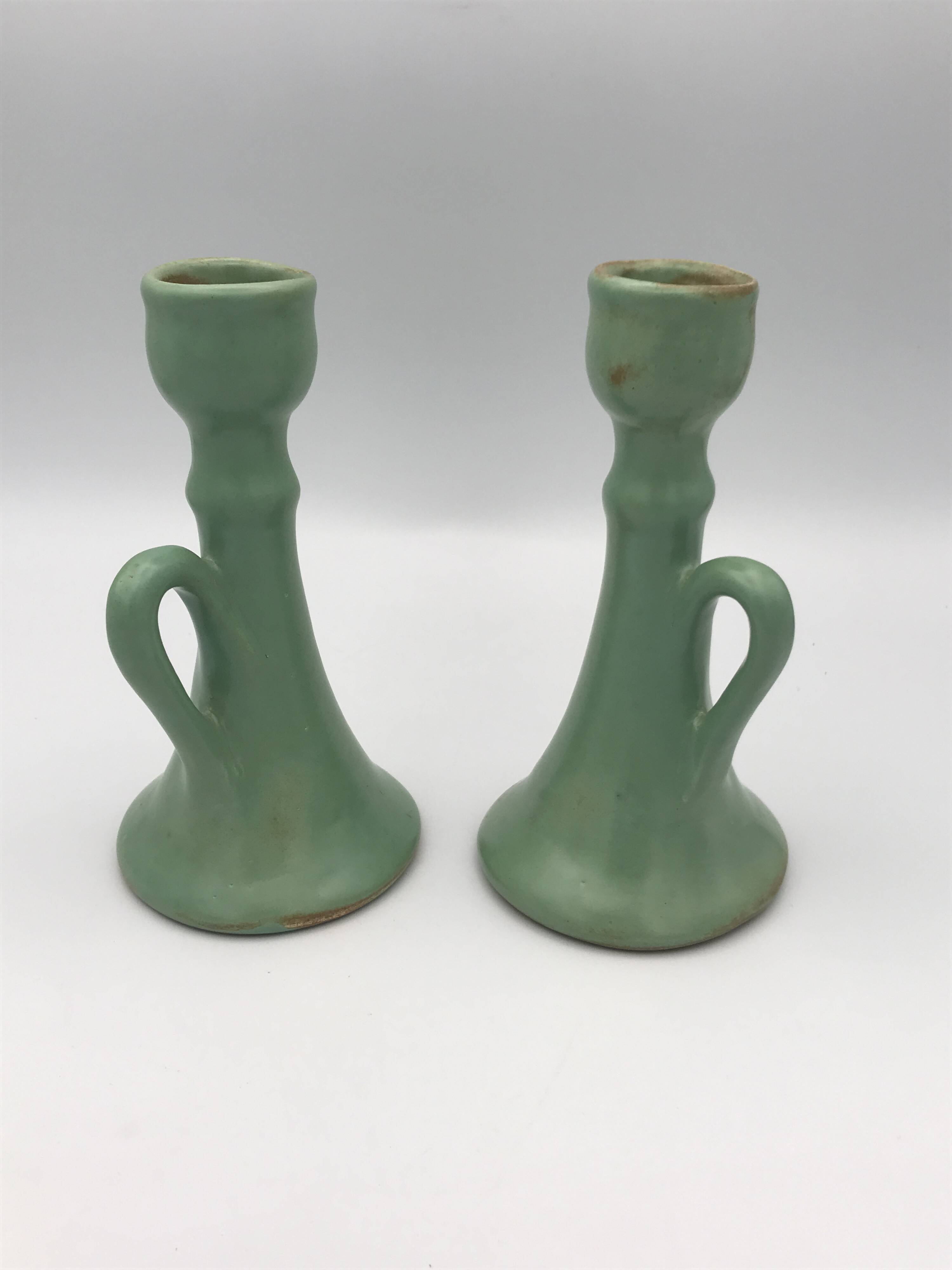 Pair of vintage table candle holders in green enameled ceramic