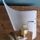Golden metal appliques and plexiglass perspex in the style of Maison Lunel or Guariche.