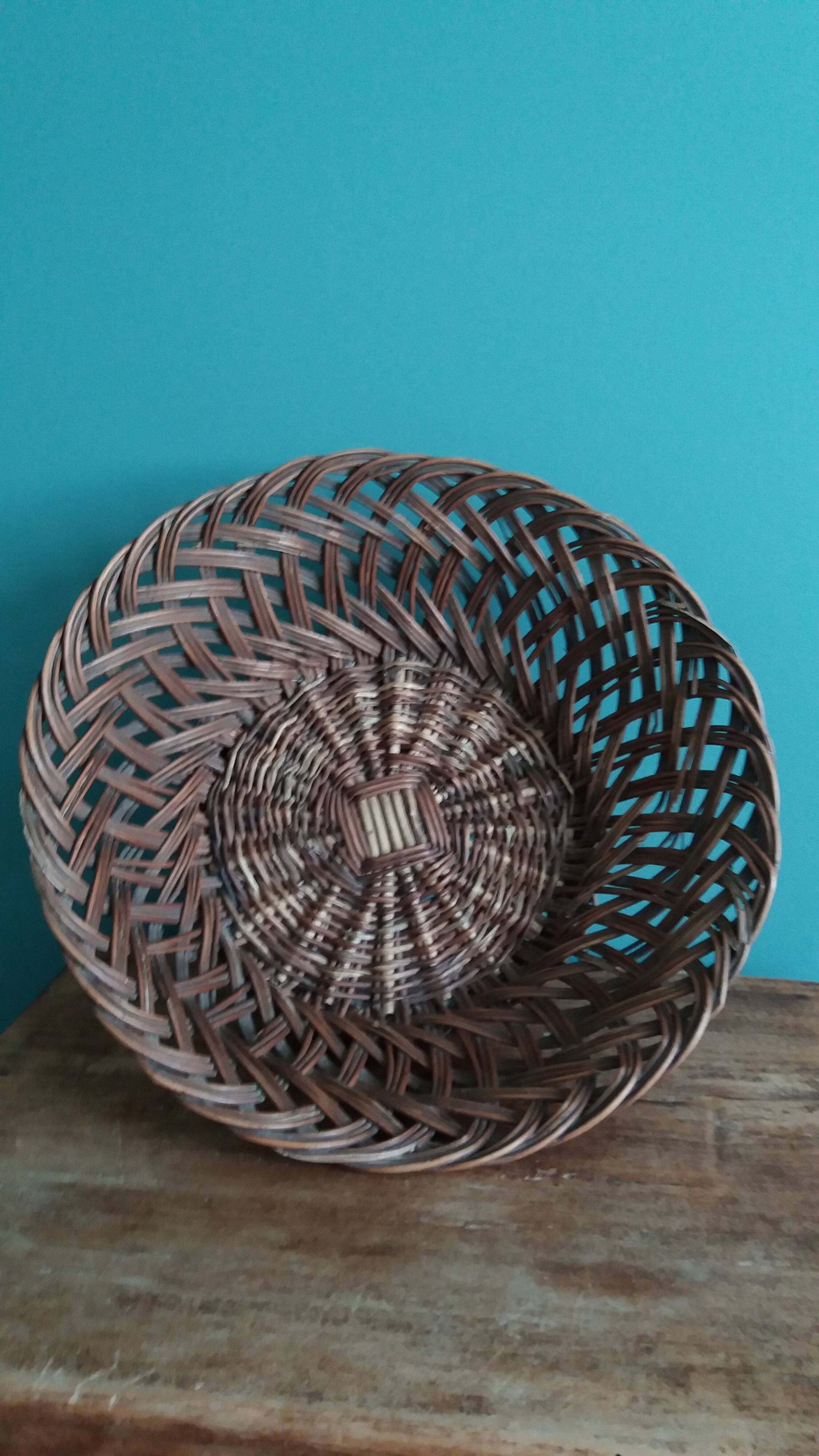 Antique basket, fruit basket or bread basket made of wicker