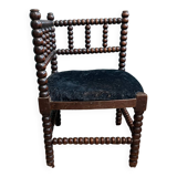 Petit fauteuil d’angle