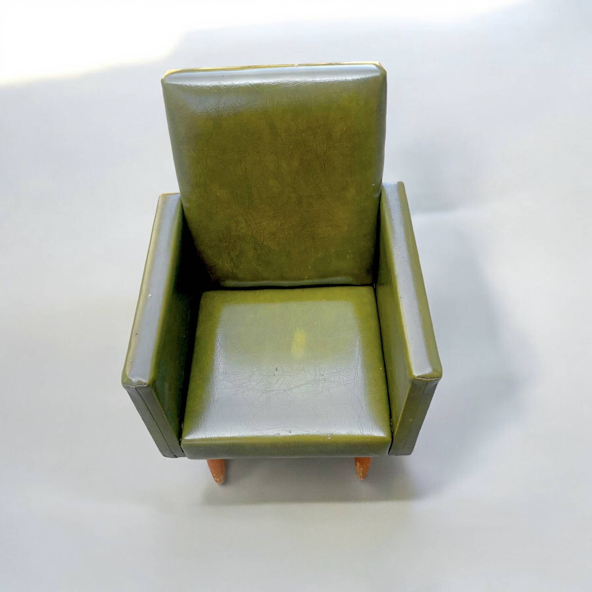 Vintage children's armchair in green skai