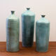 Trio de vases soliflores bouteilles en céramique emaillé