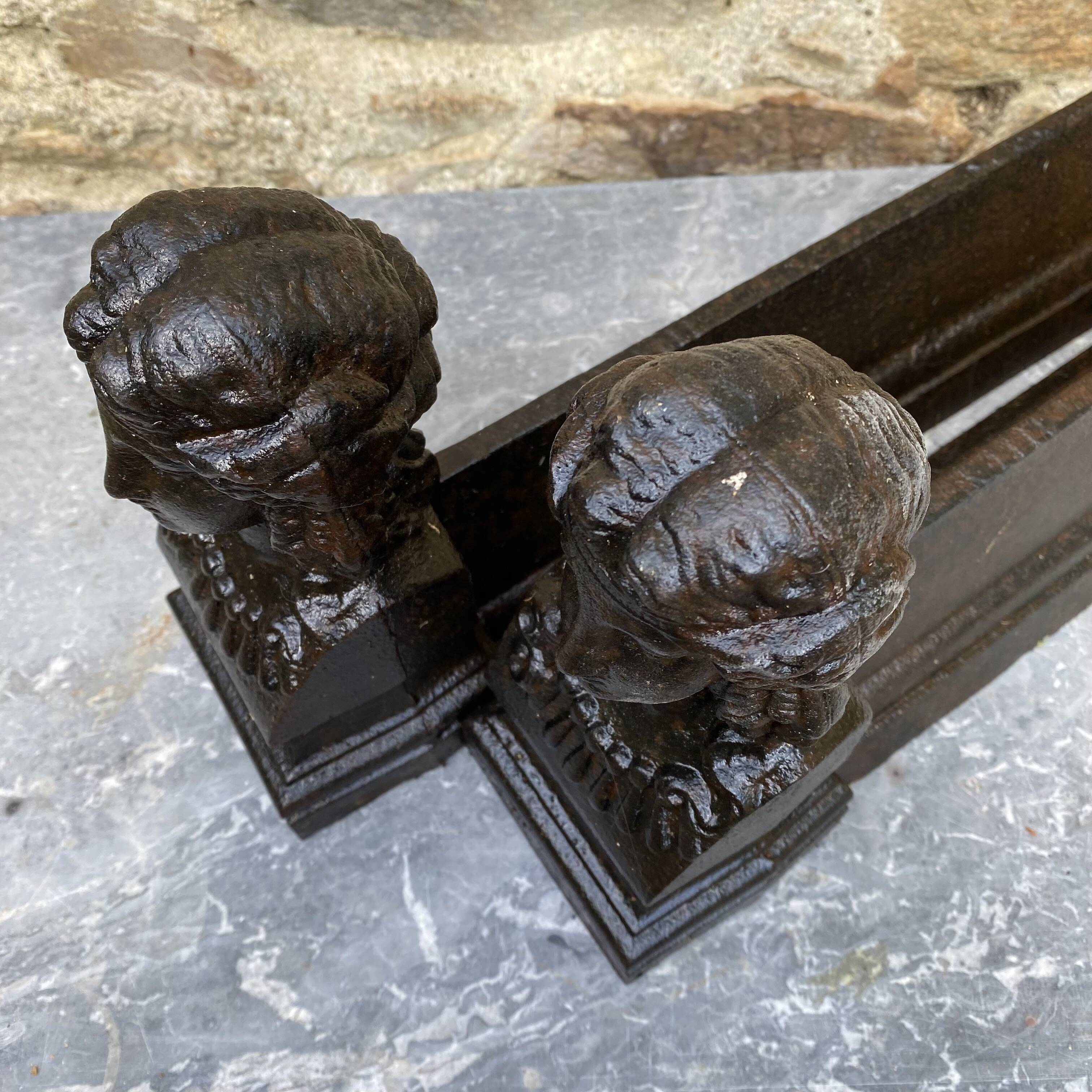 Pair of antique cast iron fire dogs "Ariadne"