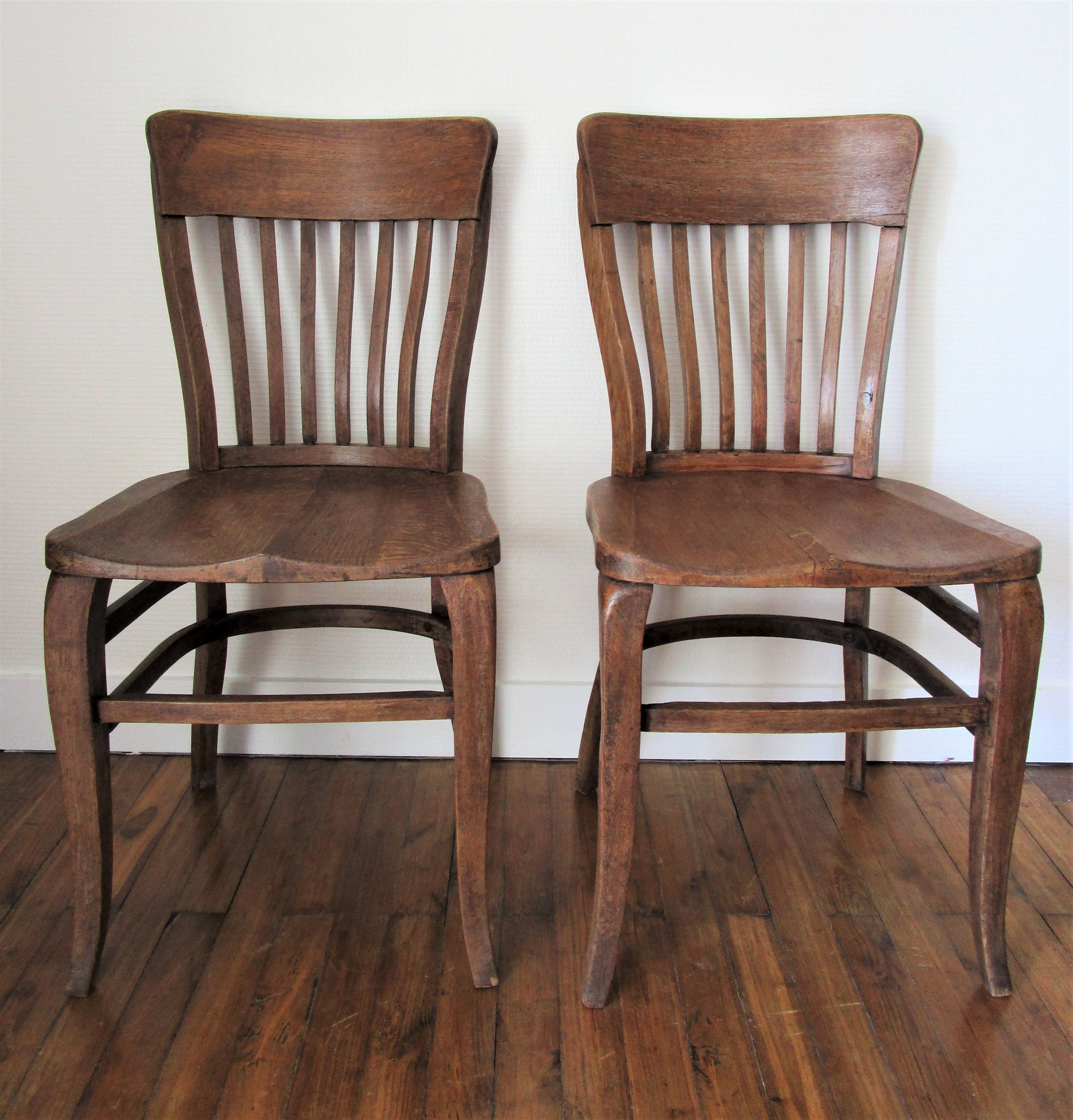 Two chairs solid oak patinated early twentieth century