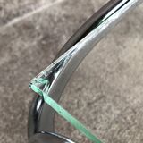 Coffee table with chrome legs and glass top, 1970