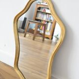 Golden mirror in wood and gold leaf