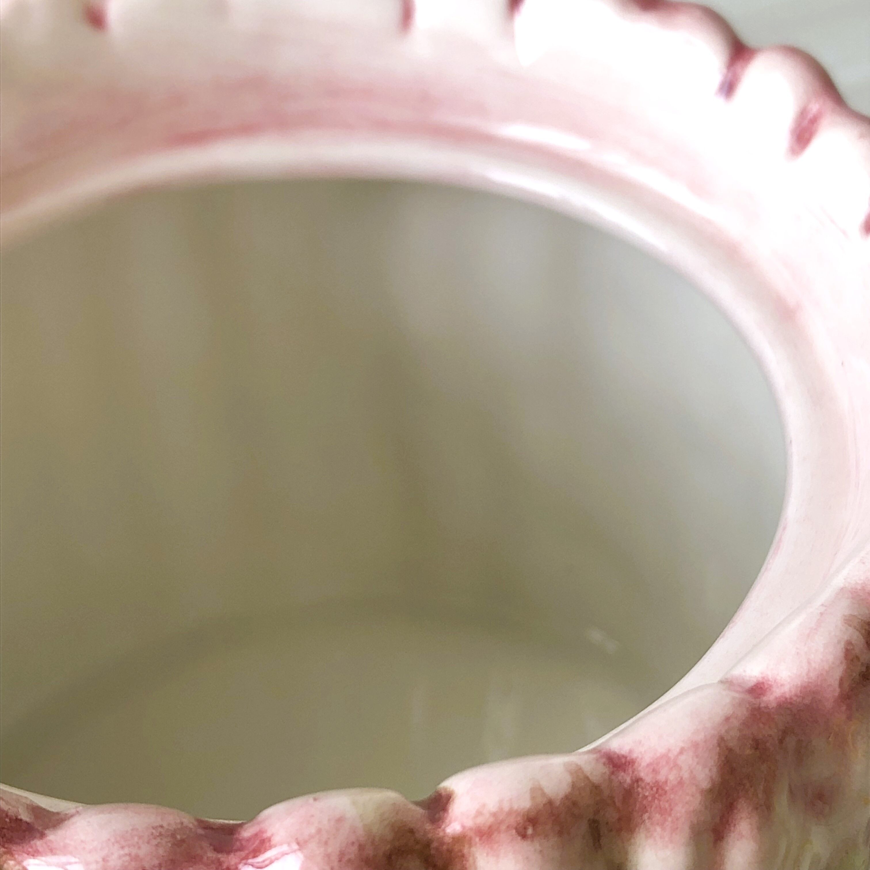 Old mustard pot and its slid in slurry decoration bunch of asparagus.