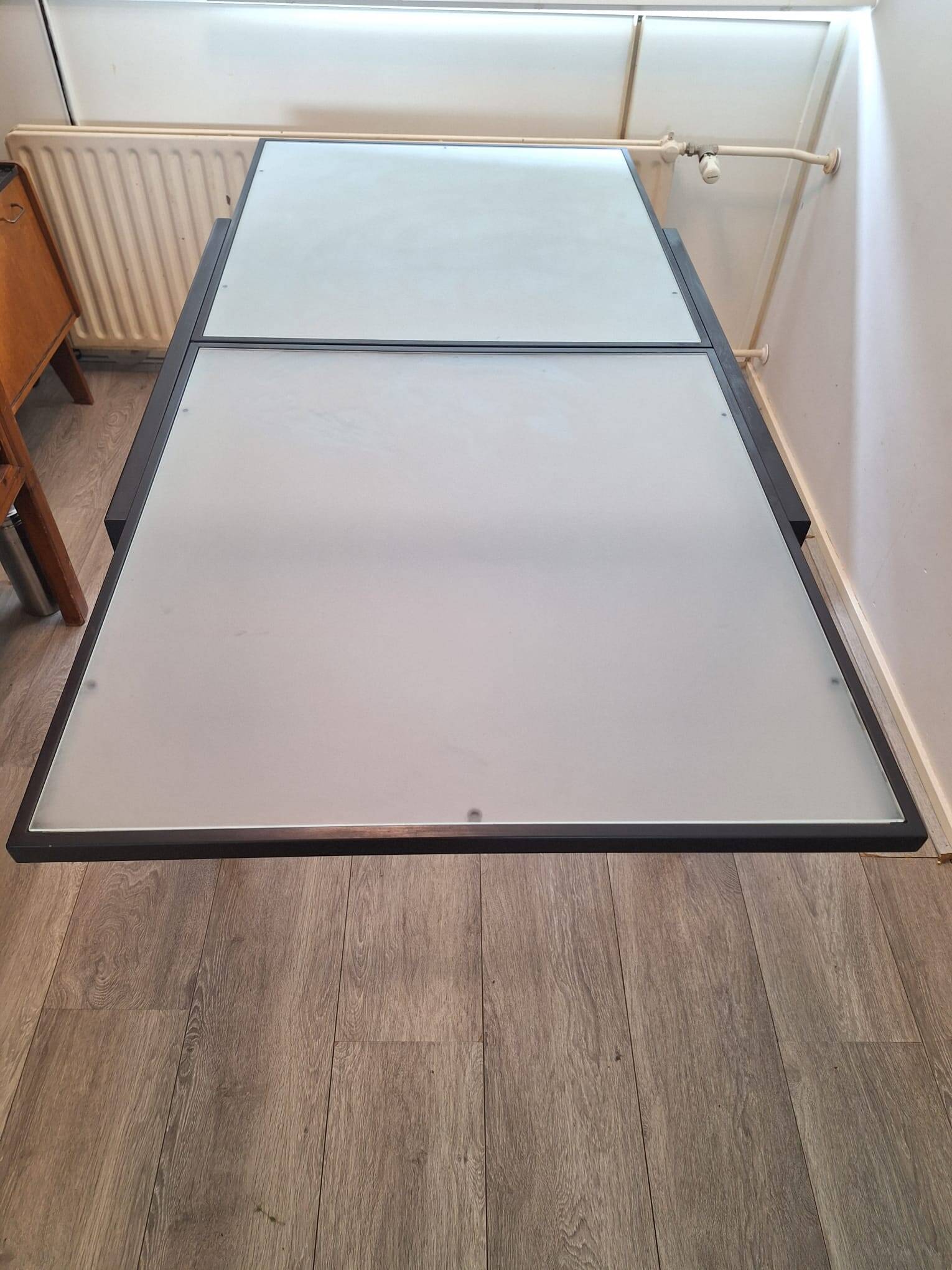 Italian metal table with frosted glass top, extendable.