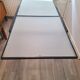 Italian metal table with frosted glass top, extendable.