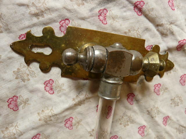 Chromed metal towel rack and glass rod