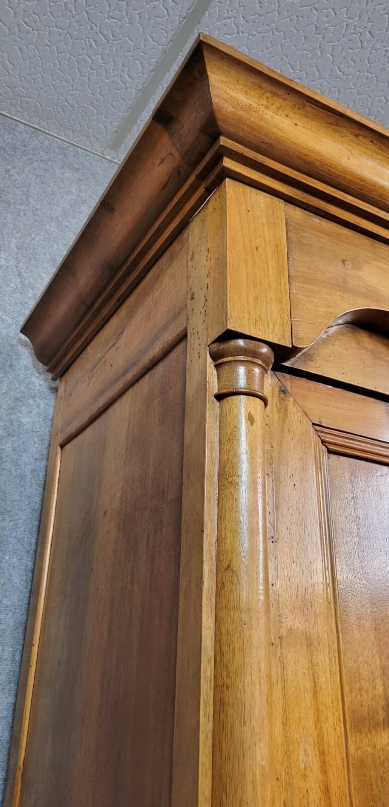 Empire period wardrobe, made of solid walnut, dating from the early 19th century.