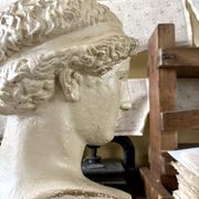 Concrete bust painted in beige - reproduction, detail of "The Dying Slave"