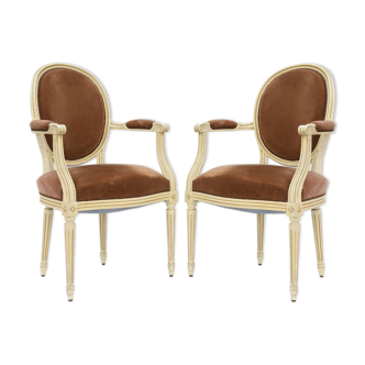 Pair of Louis XVI style convertible armchairs