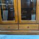 Vitrine en merisier 2 portes / 2 tiroirs