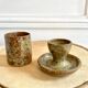 Egg cup and bowl set in pyrite stoneware