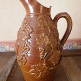 Beauvais sandstone pitcher decorated with a prizery
