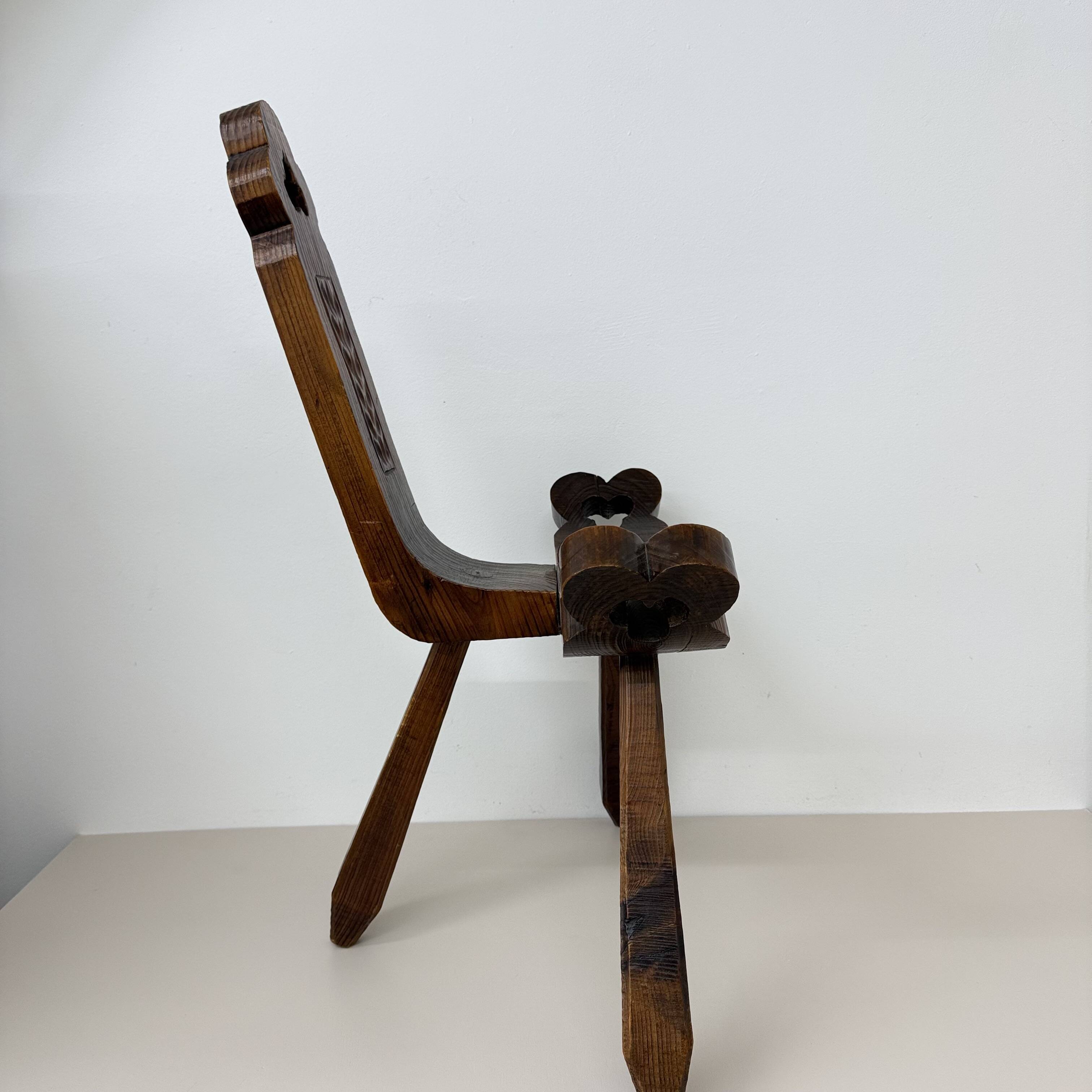 Brutalist hand carved oak Spanish tripod chair , 1970s
