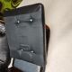 Fauteuil lounge cuir noir 1970 vintage