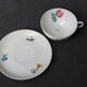 Set de 6 tasses et sous-tasses en porcelaine de Limonges NBD, enluminées à la main, motifs fleuris