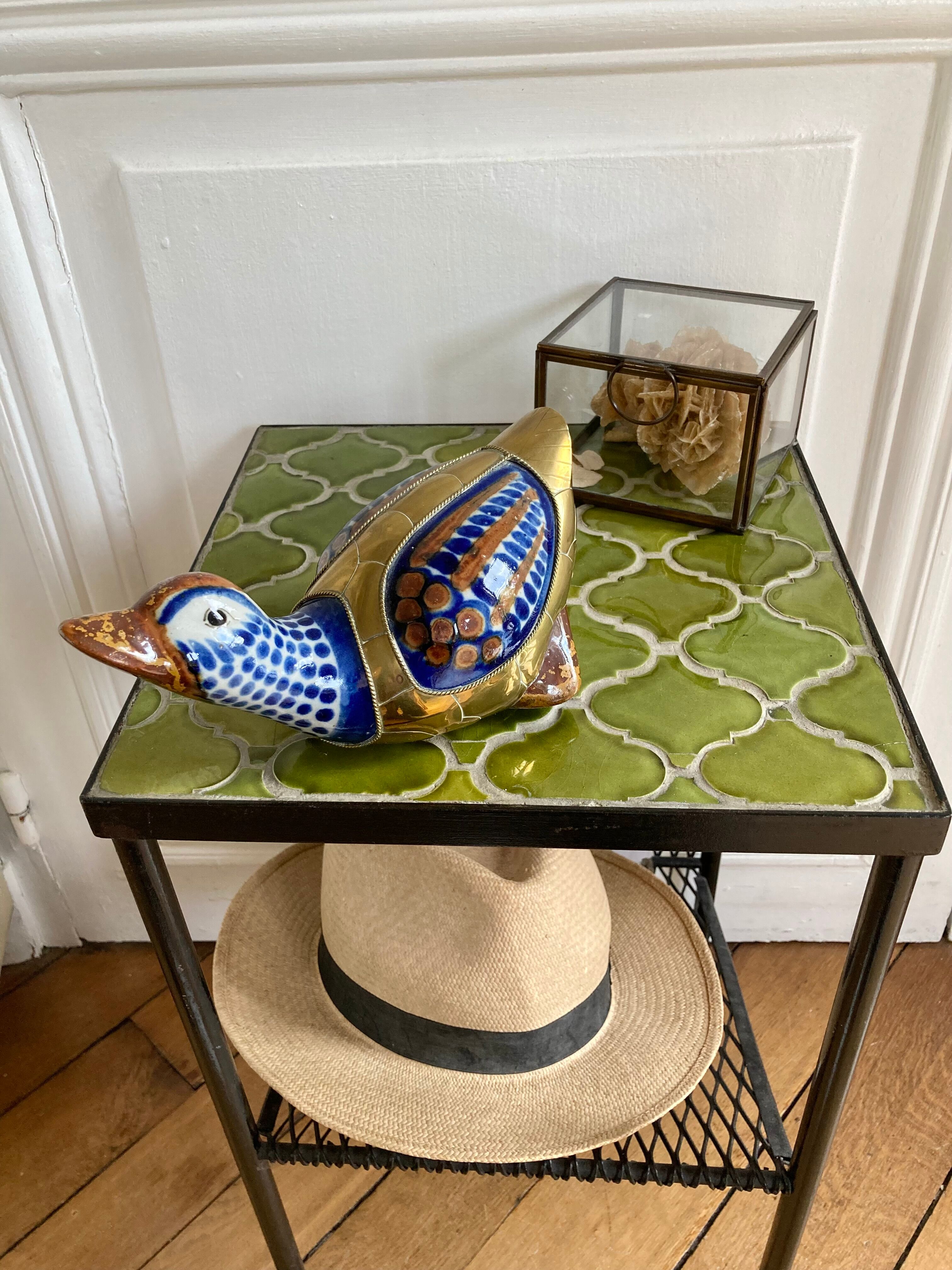 Brass duck and ceramic