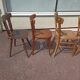 Set of 12 mismatched wooden bistro chairs