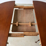 Scandinavian design extendable round table in teak, Danish manufacture.