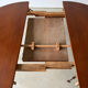Scandinavian design extendable round table in teak, Danish manufacture.