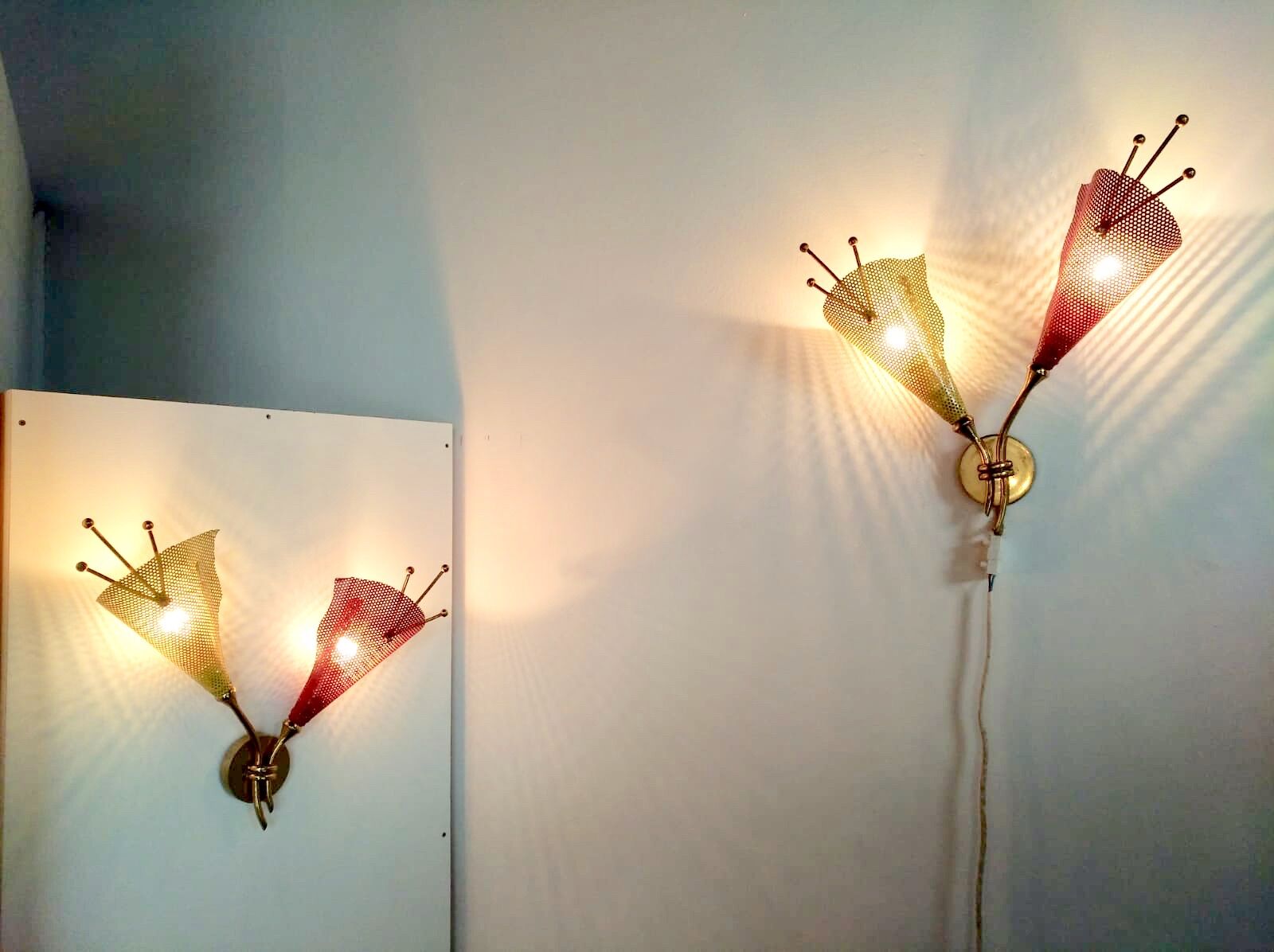 Pair of wall lamps metal perforated color, France 1950