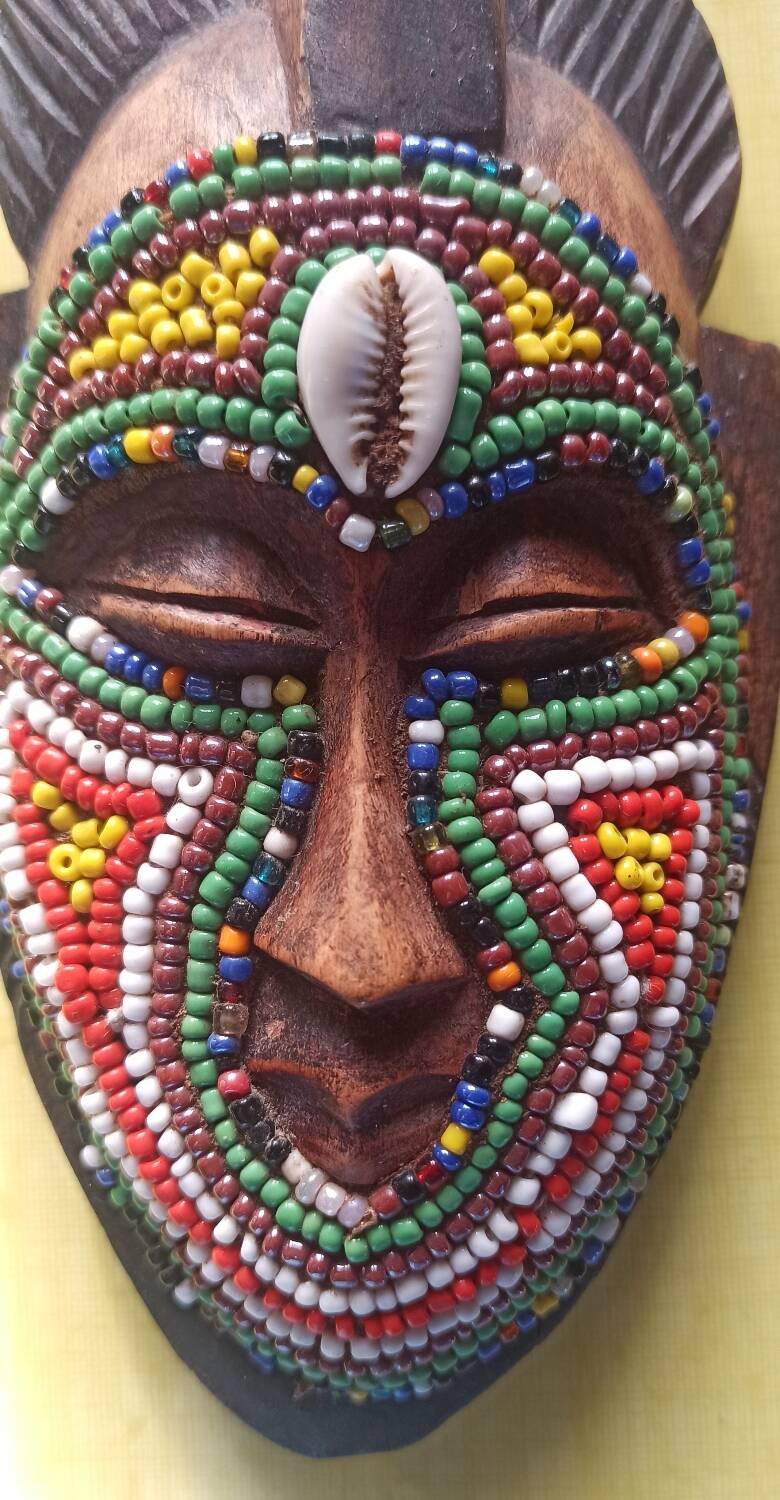 African mask with beads