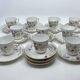 Porcelain tea service with floral and butterfly decorations, 25 pieces.