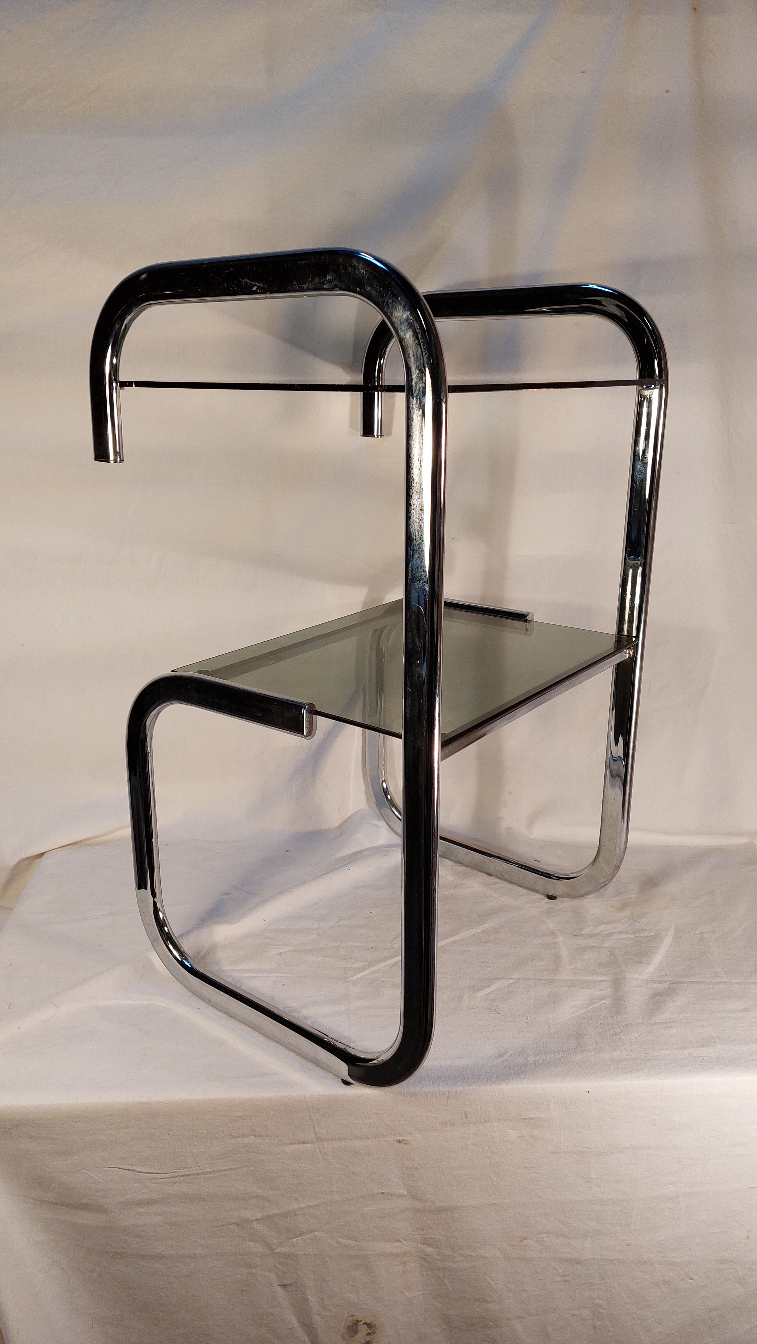 Vintage side table in chrome and smoked glass