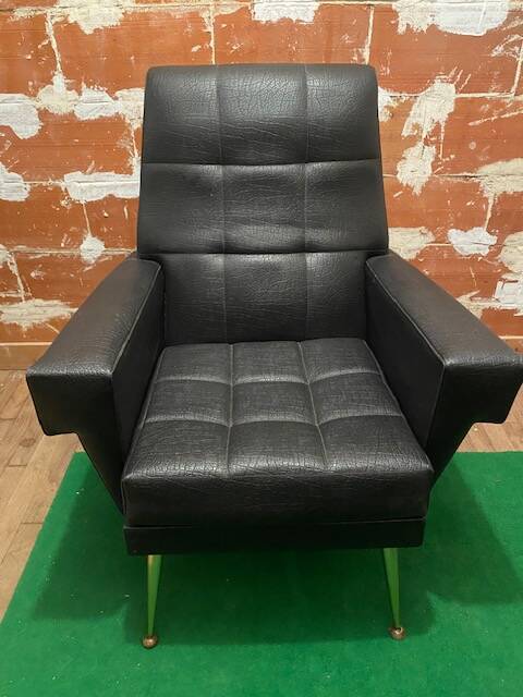 Pair of vintage leather armchairs