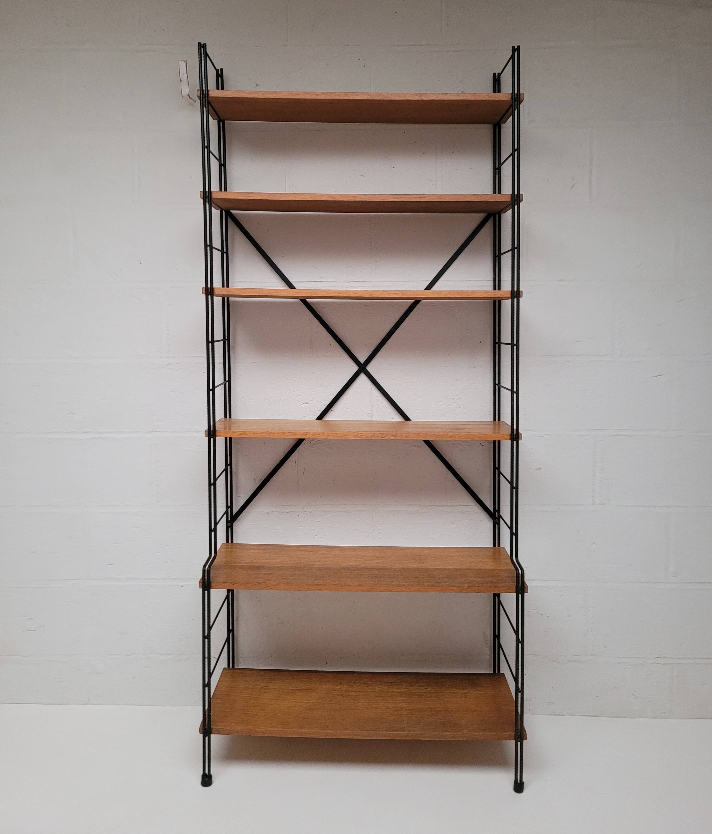String bookcase on legs from the 50s