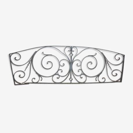 Old cast iron pediment door grille