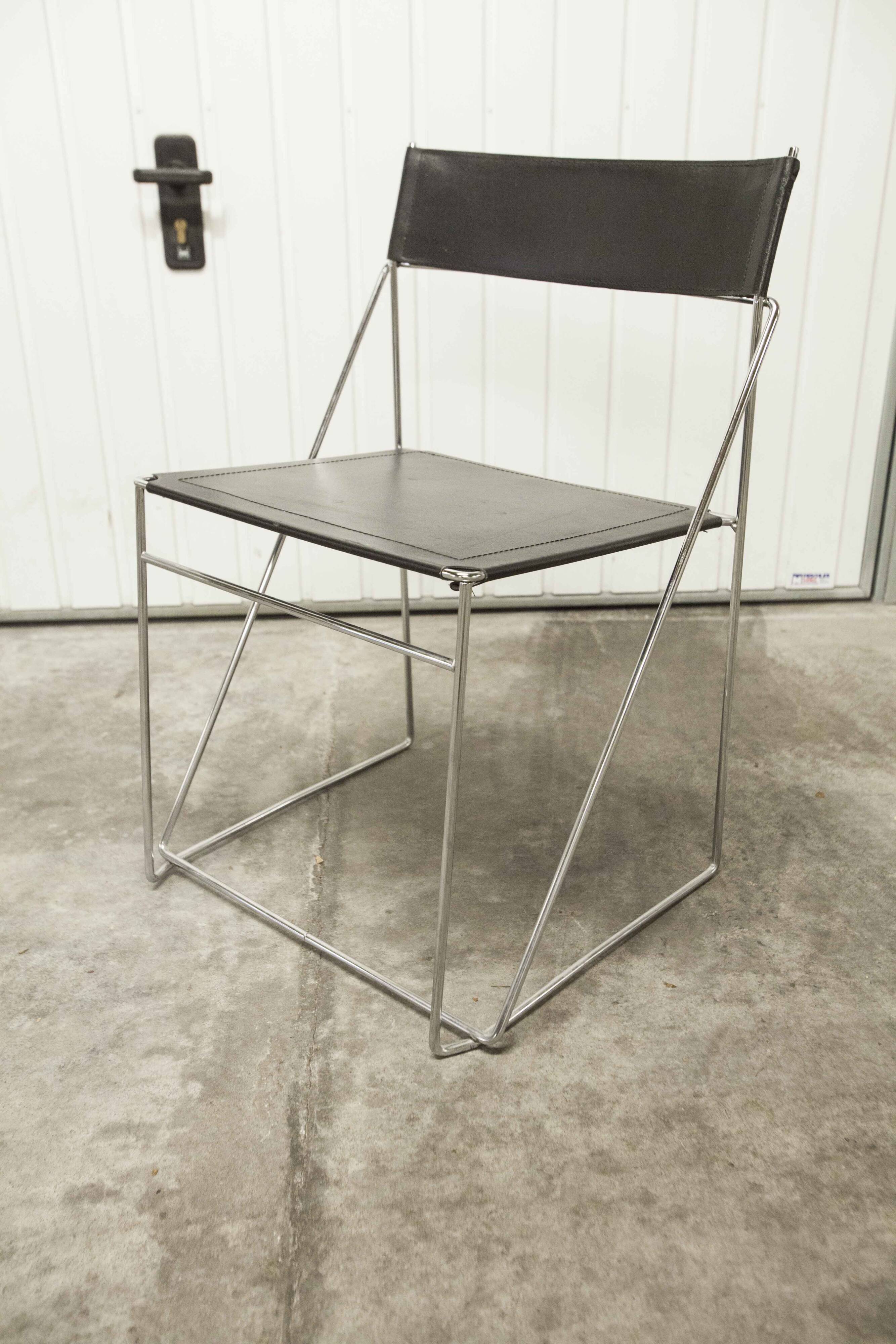 Set of 3 minimalist X line chairs by Niels Jorgen Haugesen.