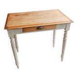 Antique wooden desk with a patinated base