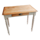 Antique wooden desk with a patinated base