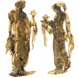 Pair of gilded bronze bas-reliefs of women