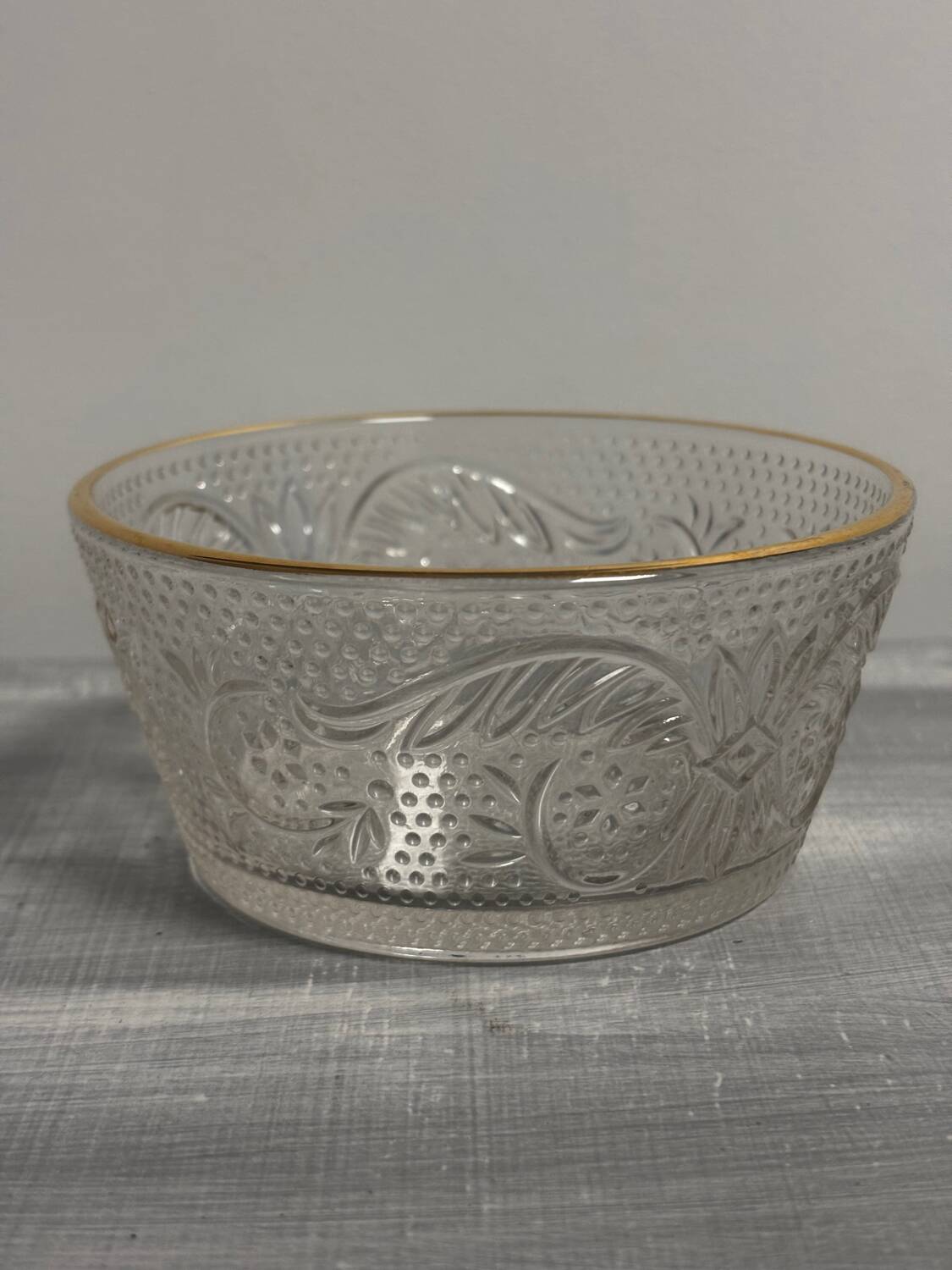 Set of 3 glass bowls with gold embellishments.
