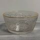Set of 3 glass bowls with gold embellishments.