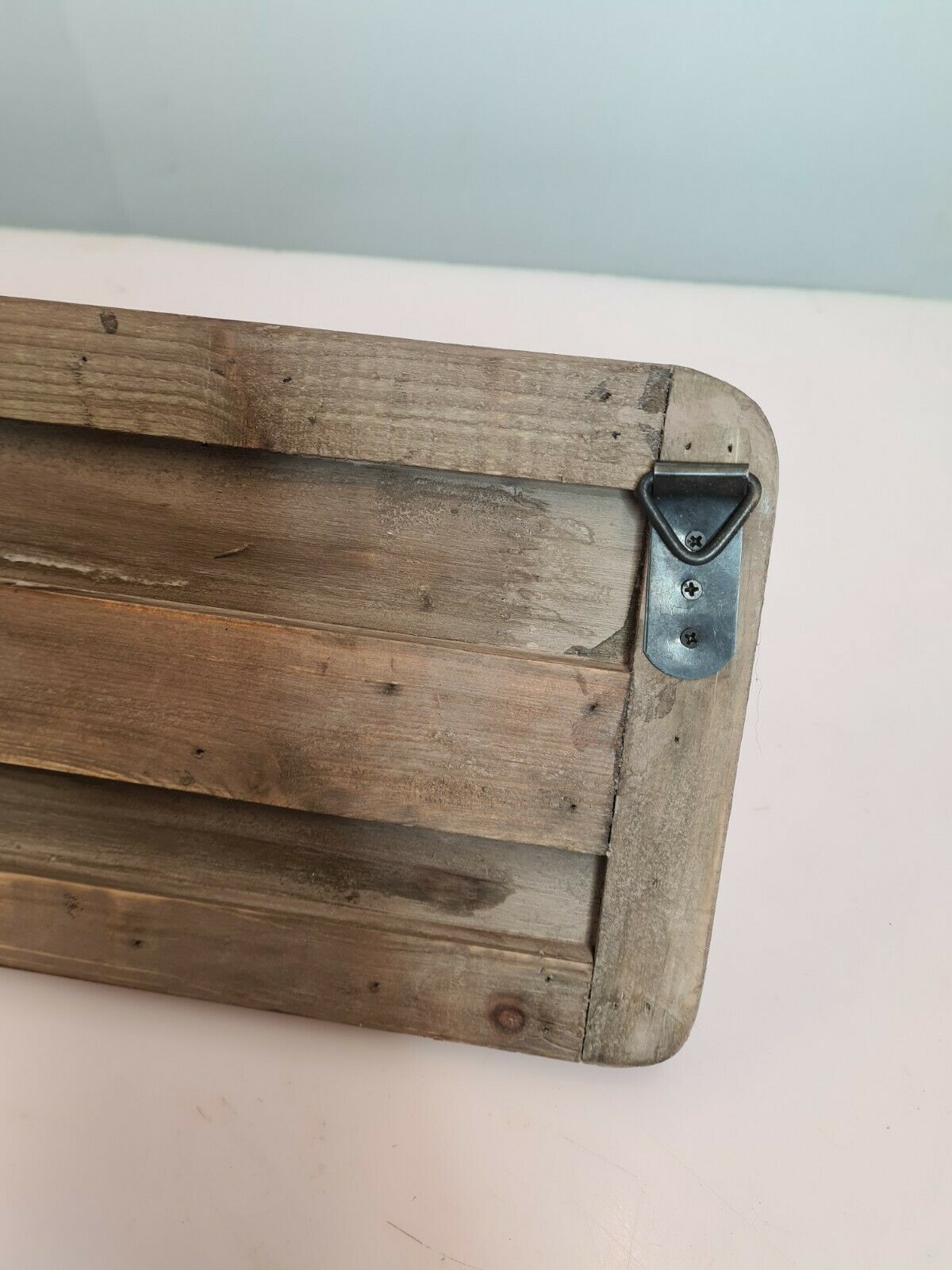 wooden school coat rack and iron hooks
