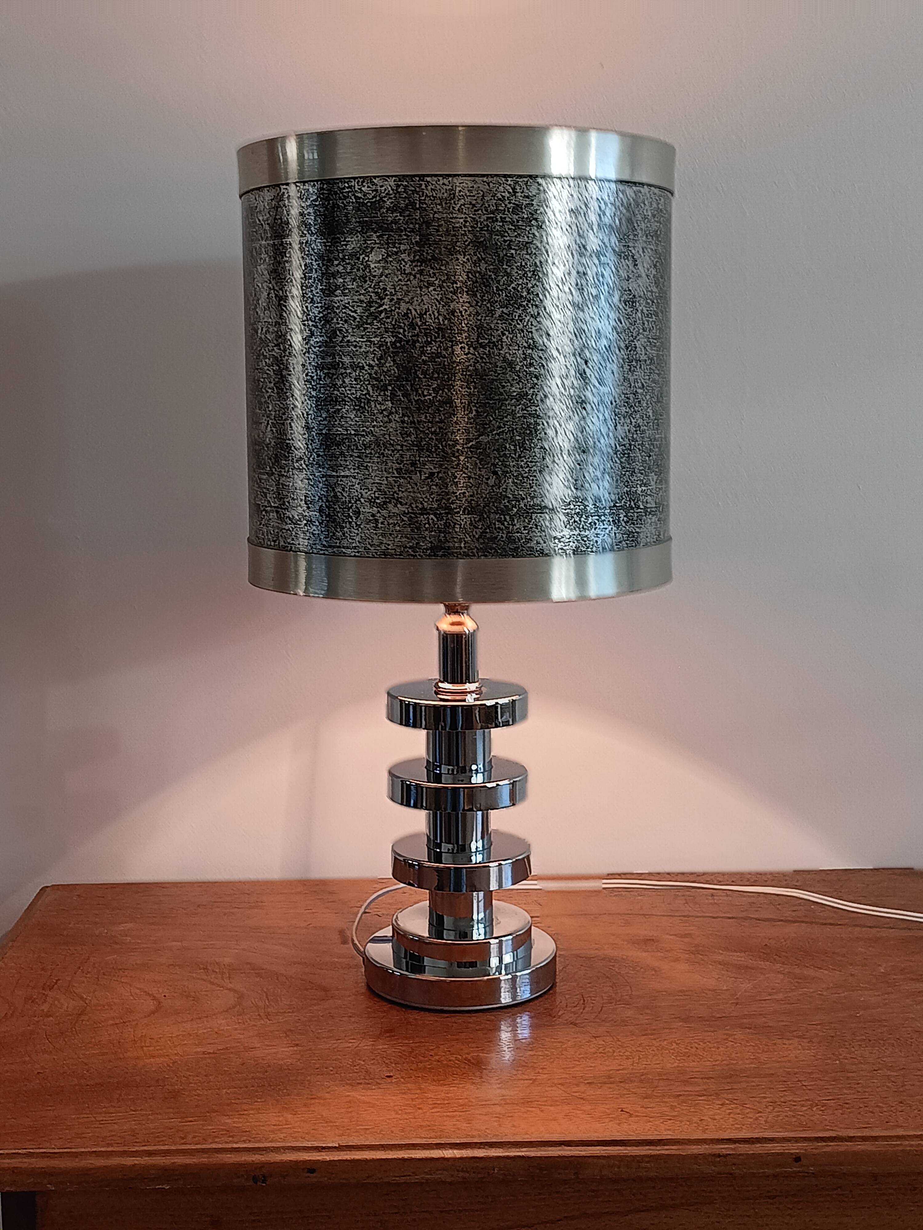 Chromed metal lamp and metallic paper lampshade. 70s