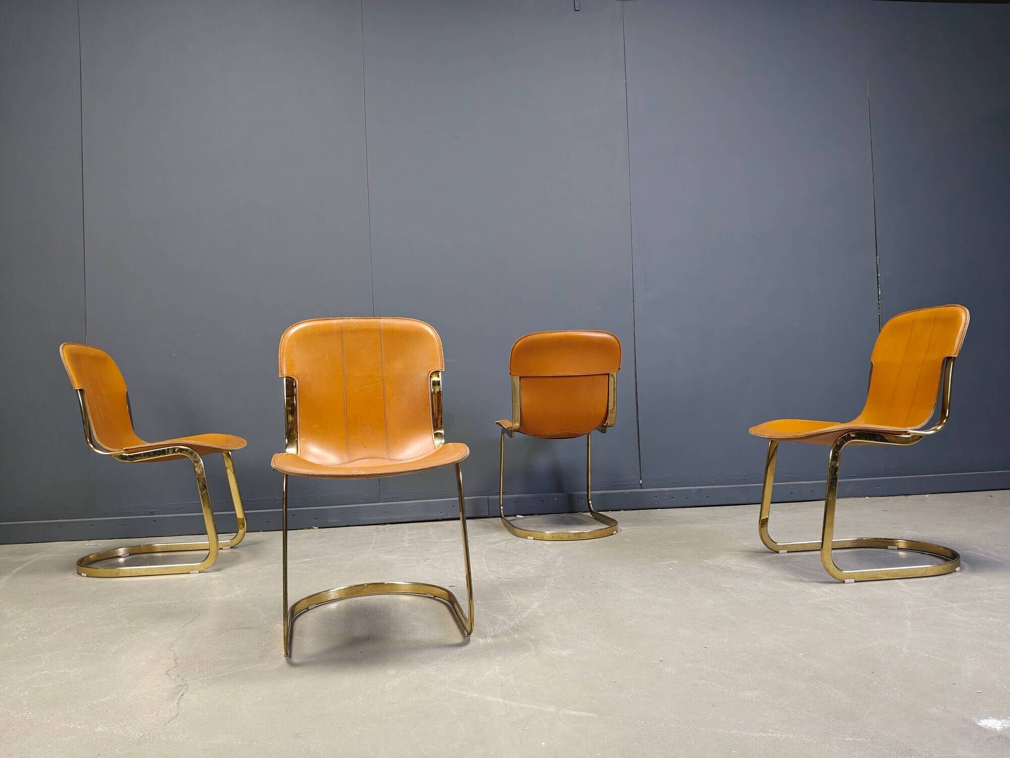 Vintage brass and cognac leather dining chairs by Willy Rizzo for Cidue set of 4